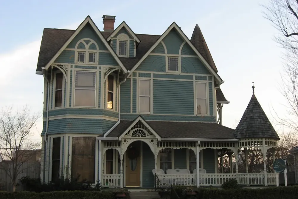 The Victorian Charles Barr House with gables, a turret and a front porch in Greenfield, Indiana