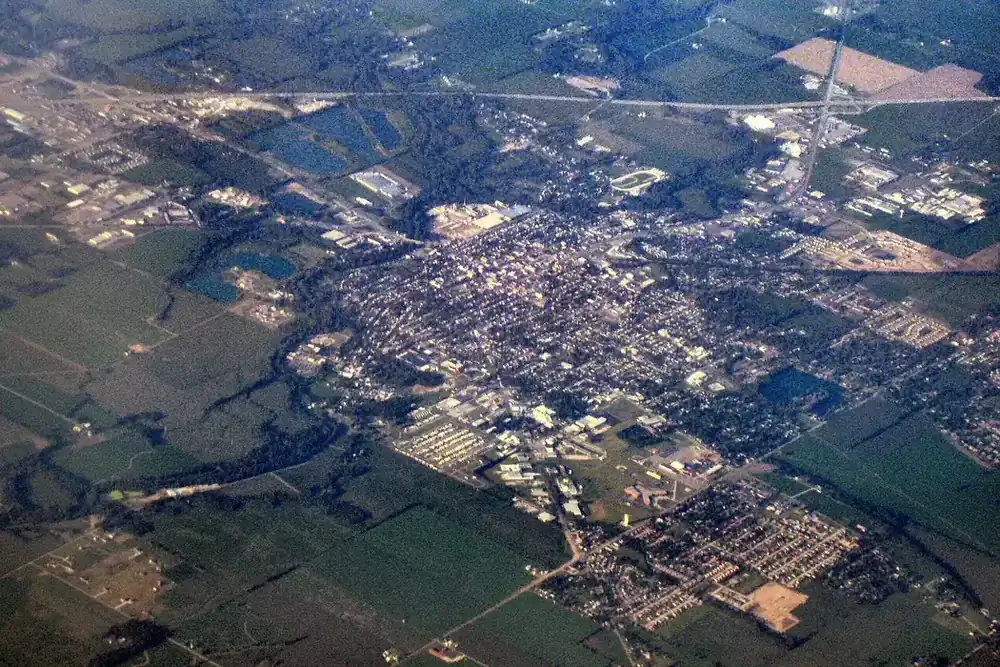Aerial view of Shelbyville, Indiana, its streets and neighborhoods surrounded by farm fields
